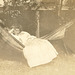 Summertime and the livin' is sultry.  My grandmother in the hammock, c. 1910