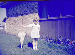 My sister with my grandmother's heirloom parasol