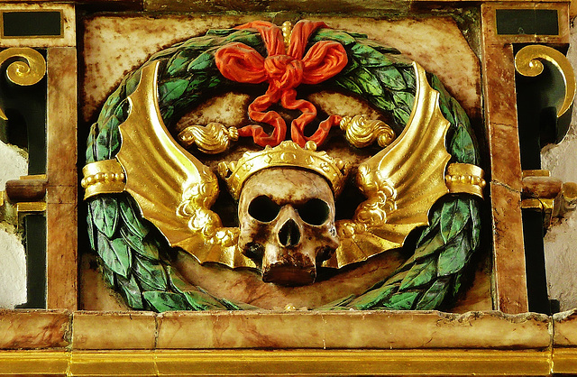 king's lynn, st. nicholas church, c17,winged skull detail of the tomb of thomas snelling and his wife margaret. he died in 1623, was an alderman who lived in clifton house, and may have built the towe