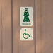 Accessible women's restroom sign