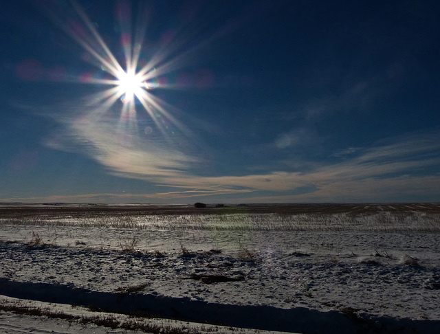 Sun flare over the Prairies