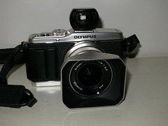 Olympus E-P3 with 12/2 lens and Voigtlander 25mm viewfinder.