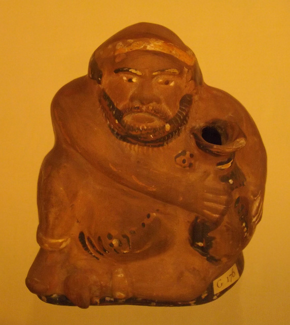 Flask in the Form of a Fat Man Holding an Askos with a Woman's Head in the British Museum, May 2014