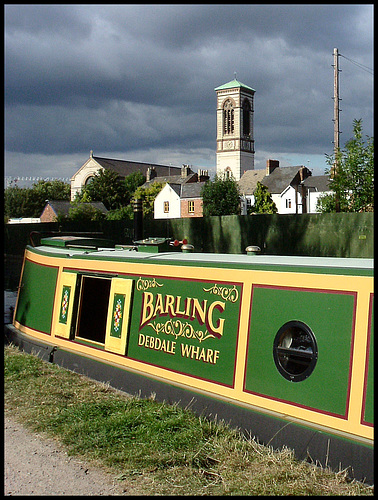 grey clouds on the canalside