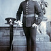 Photo of Royal Artillery Gunner with Bamboo Stick & Peaked Cap c1910