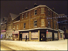 old city corner on a snowy night