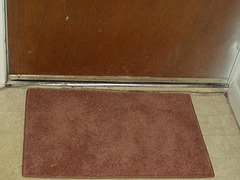 1st apartment - door mat