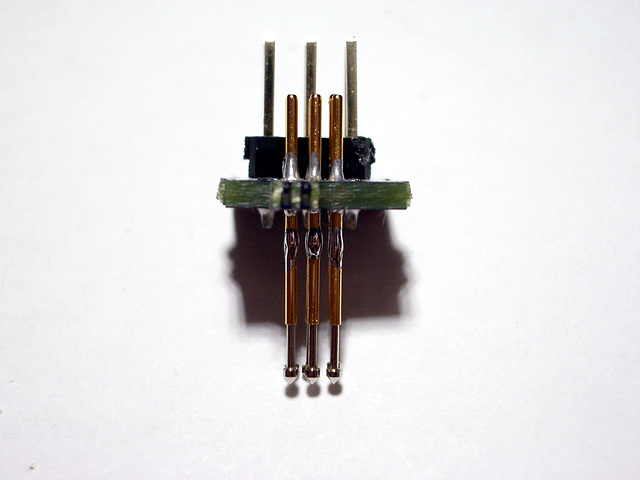 Pogo-pin weak spot covered with blob of solder