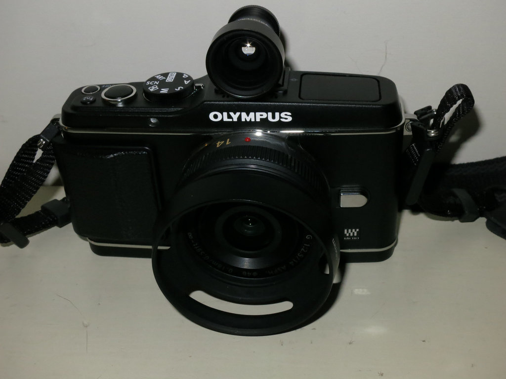 Olympus E-P3 with Panasonic 14/2.8 and Voigtlander 28mm finder.
