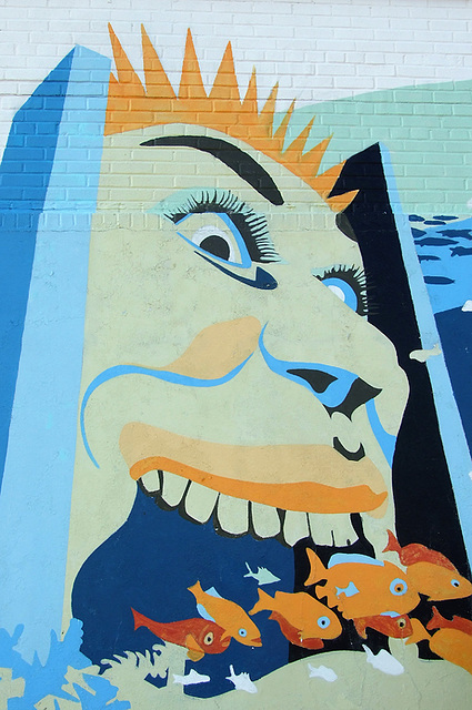 Steeplechase Guy Swallowing Fish on a Wall near the Aquarium in Coney Island, June 2008