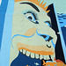 Steeplechase Guy Swallowing Fish on a Wall near the Aquarium in Coney Island, June 2008