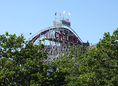 The Cyclone Roller Coaster and  Trees from the Boardwalk in Coney Island, June 2007