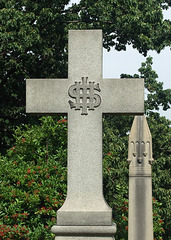 Detail of the Cross with a Dollar Sign Monument in Woodlawn Cemetery, August 2008