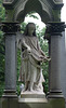Detail of a Grave Monument with a Sculpture of a Girl with Flowers in Woodlawn Cemetery, August 2008