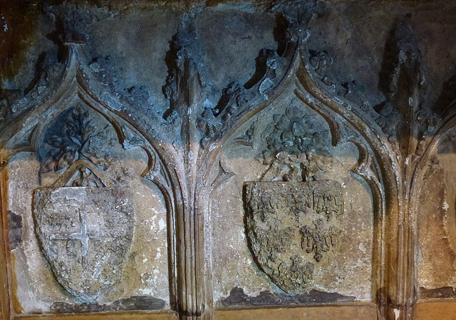 winchester cathedral, hants.arnold de gaveston's c14 heraldic chest tomb has been used in the nearby chapel of the guardian angels as an altar front. it bears the royal arms of england , france, casti