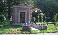 A Modern Mausoleum with a Trellis and Statues in Woodlawn Cemetery, August 2008