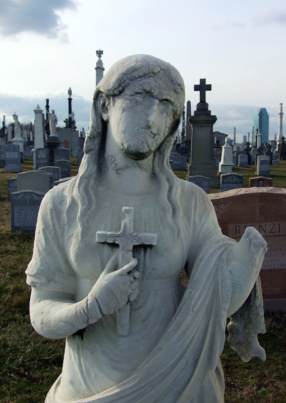 Detail of a Weathered Statue of a Saint in Calvary Cemetery, March 2008