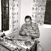 The '50s: Dad, burning the midnight oil preparing to attack the fish in the morning. Moon's Lake Resort, Wisconsin, 1952