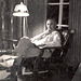 The '50s: Grandpa Rudy looks up from his reading in the cabin at Turtle Lake, WI. 1957