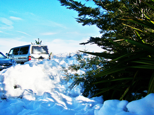 Snow drifts at roadside cafe