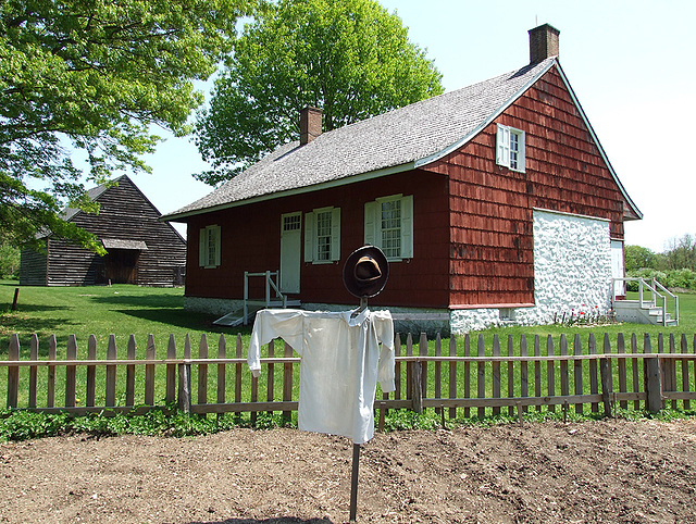 Scarecrow in the Garden of the Schenck House in Old Bethpage  Village Restoration, May 2007