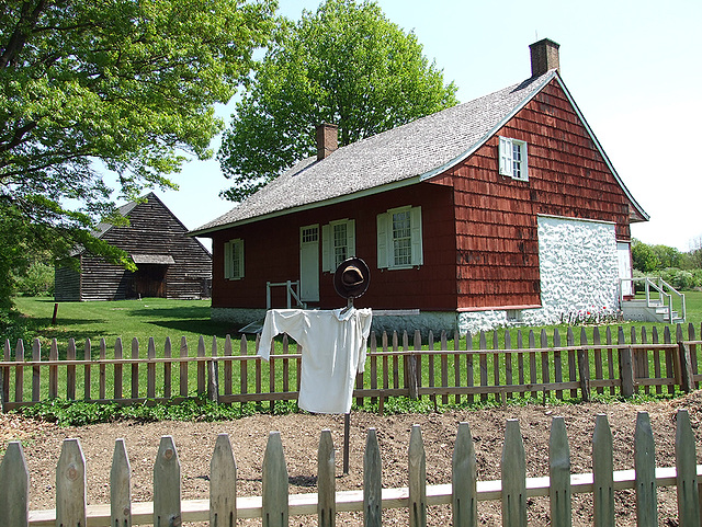 Scarecrow in the Garden of the Schenck House in Old Bethpage Village Restoration, May 2007