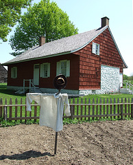 Scarecrow in the Garden of the Schenck House in Old Bethpage  Village Restoration, May 2007