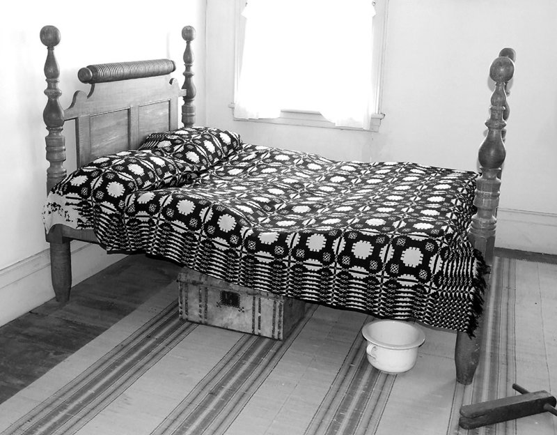 Bed in the Noon Inn in Old Bethpage Village Restoration, May 2007