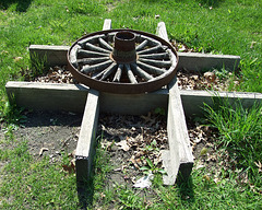 Wheel Outside of the Bach Blacksmith Shop in Old Bethpage Village Restoration, May 2007