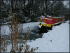 red boat in the snow