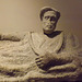 Detail of an Etruscan Nenfro Sarcophagus of a Reclining Man from Orte in the Vatican Museum, July 2012