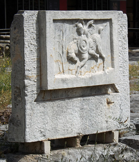 Reproduction of the Relief of Marcus Curtius from the Lacus Curtius in the Forum in Rome, June 2012