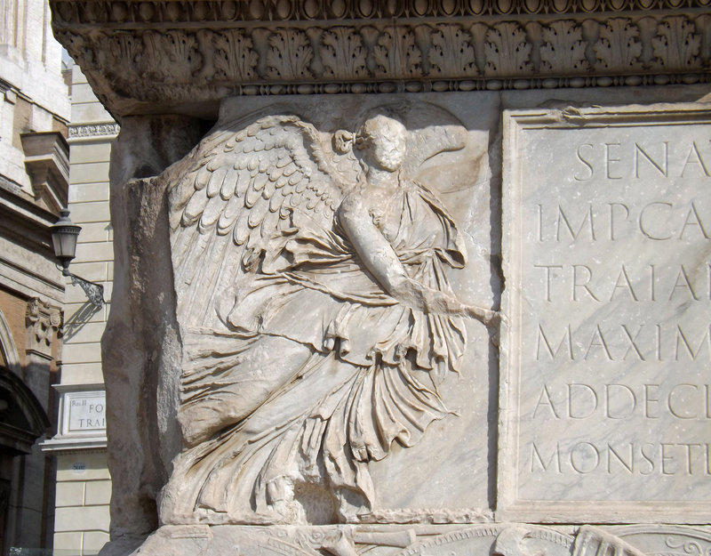 Detail of one of the Victories on the Base of the Column of Trajan in Rome, July 2012