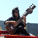 Zitar Player for the Chumdog Millionaire Group at the Coney Island Mermaid Parade, June 2010