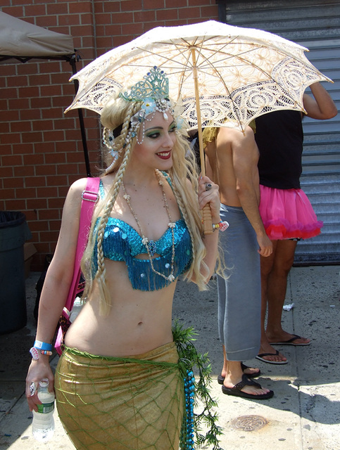 Blonde Mermaid with a Parasol at the Coney Island Mermaid Parade, June 2010