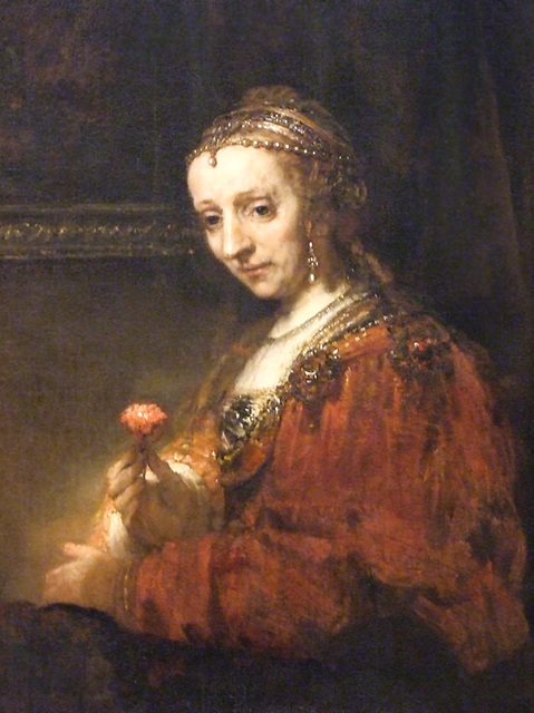 Detail of Woman with a Pink by Rembrandt in the Metropolitan Museum of Art, December 2010