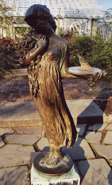 Bronze Sculpture of a Girl Holding a Sundial in the Rose Garden of the Brooklyn Botanical Garden, Nov. 2006