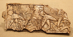 Assyrian Ivory Plaque with Two Sphinxes Each Trampling a Fallen Asiatic in the Metropolitan Museum of Art, August 2008 Assyrian Ivory Plaque with Two Sphinxes Each Trampling a Fallen Asiatic in the Metropolitan Museum of Art, August 2008