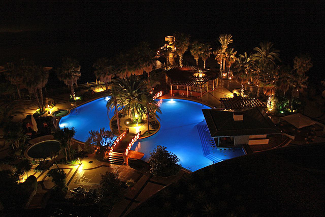 The hotel pools by night