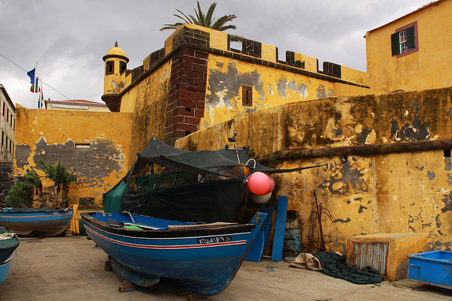 The old fort and fishing boats