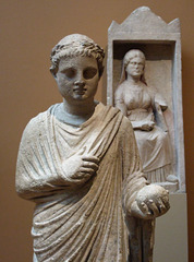Detail of a Cypriot Limestone Statue of a Boy Holding a Ball in the Metropolitan Museum of Art, July 2010