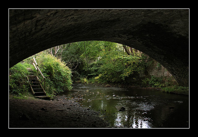 Under the aqueduct