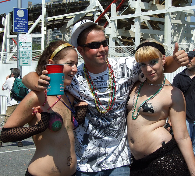 A Guy with Two Mermaids at the Coney Island Mermaid Parade, June 2008