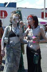 Two Silver Mermaids Blowing Bubbles at the Coney Island Mermaid Parade, June 2008
