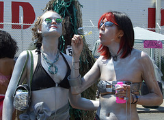 Two Silver Mermaids Blowing Bubbles at the Coney Island Mermaid Parade, June 2008