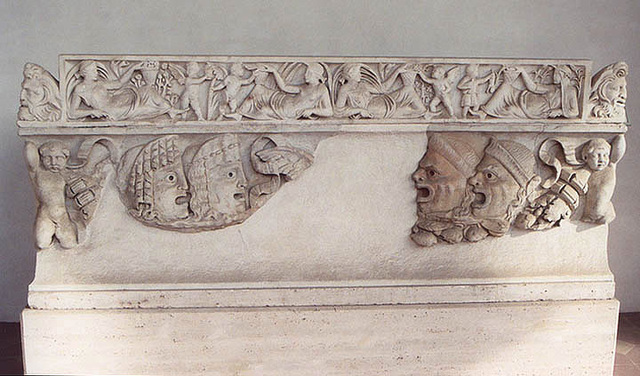 Theatrical Masks on a Sarcophagus in the Baths of Diocletian in Rome, December 2003