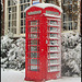 snowy red phone box