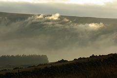 Mist rising up Torside Clough