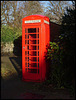 sun on an English telephone box