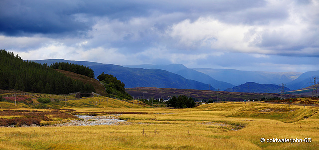 Looking over Dalwhinnie to the hills north, from the A9